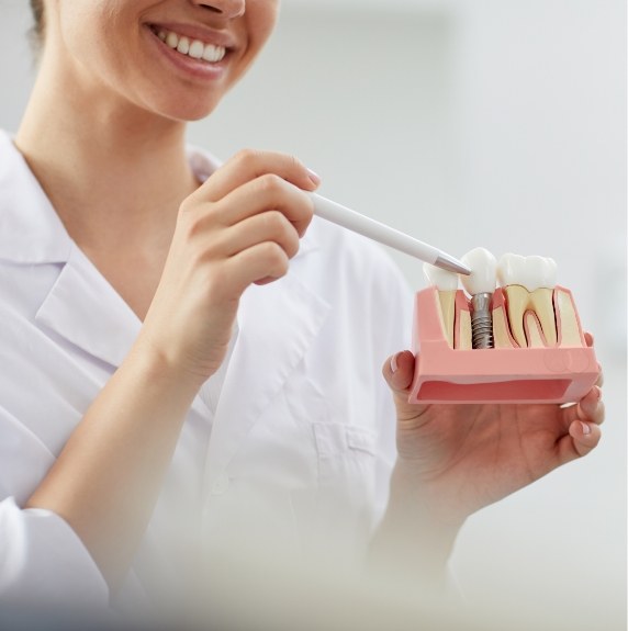 doctor showing tooth diagram